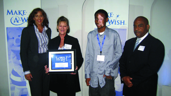 Aaron with Make-A-Wish staff in 2009