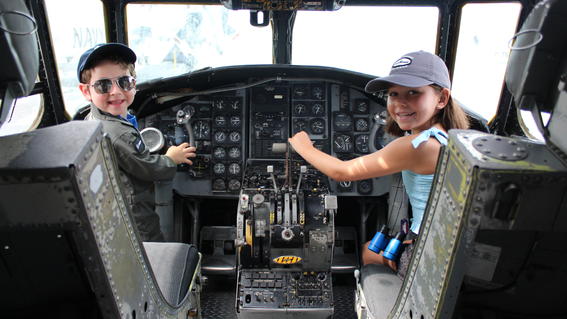 Hudson and sister in cockpit