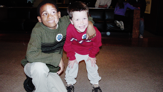 Aaron with wish kid Mathew in 2004