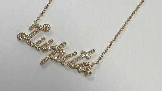 Lupita's custom necklace gifted by Padis Jewelry