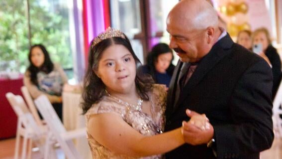 Lupita during the father-daughter dance at her quinceañera