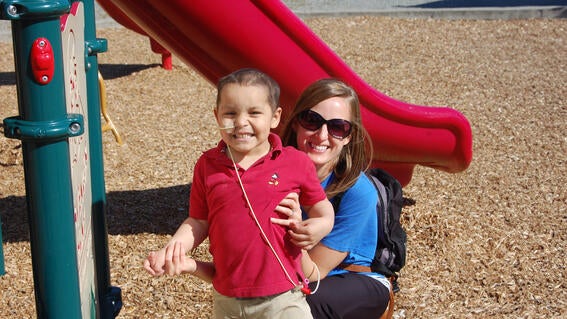 Sophie and with kid Eduardo at the Park