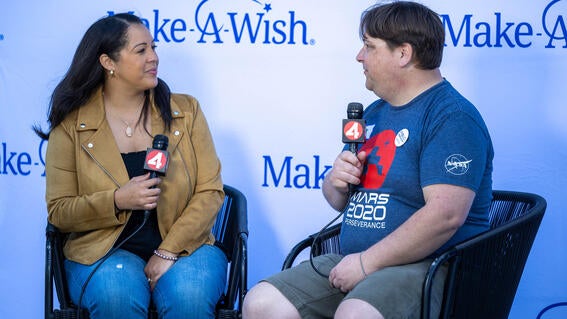 News anchor Noelle Bellow from KRON 4 Digital News interviewing wish alum Nick, who wished for a computer in 1992.