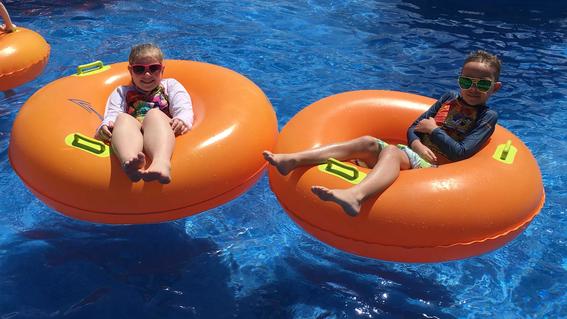 Waylon with his sister Billie Bea, enjoying the resort pool at the Nickelodeon Resort