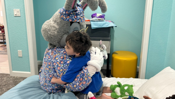 Elliott with a bunny character