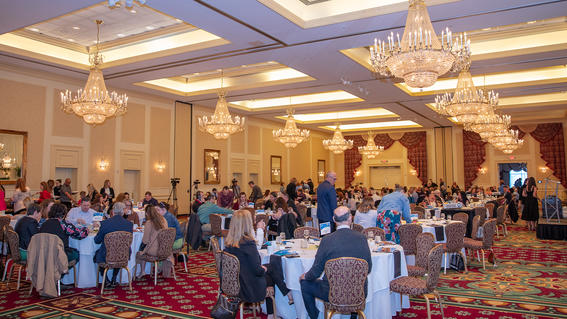 The ballroom is filled with Make-A-Wish community members, ready for breakfast and to help grant wishes.