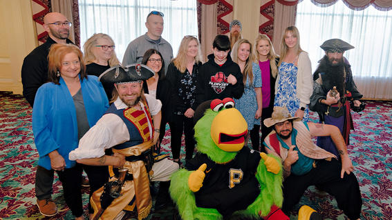 Gabe, his family, friends and the Pirate Parrot celebrate Gabe's upcoming wish in June.