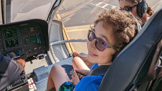 Rhydian in the front seat of the Blue Hawaiian helicopter before take-off.