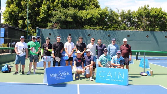 Pickleball for wishes 2023 players with sign CAIN
