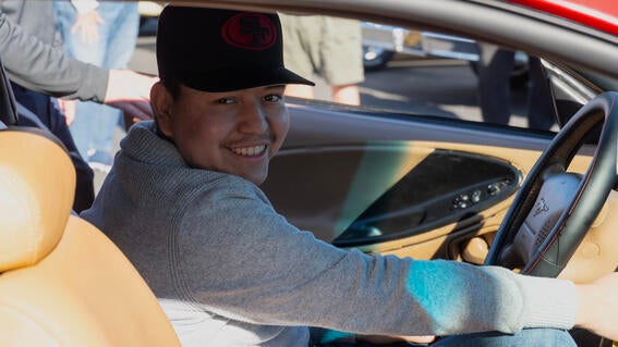 Ignacio during his wish reveal inside his restore Mustang
