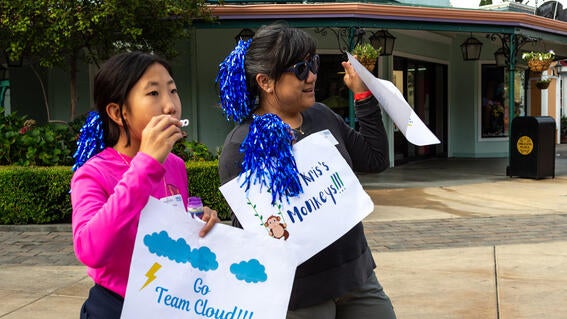 Volunteers blow bubbles at Walk for Wishes
