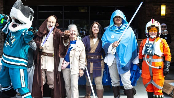 SJ Sharks Sharkie and Star Wars volunteers
