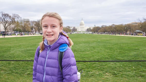 Abbie Tremp standing in front of the White House.