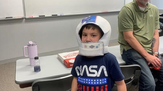 TJ with a space helmet on