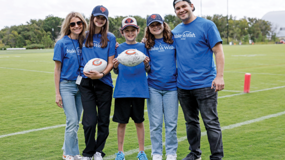 Asher and family at Halas Hall