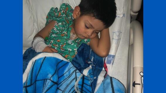 Leonel in the hospital at three years old in 2022.