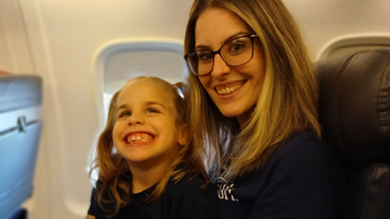 Oakley with Mom on the airplane
