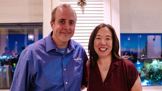 Senior Volunteer Manager Daniel Marlay with milestone volunteer Amy Crandall