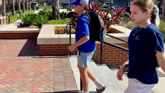 Levi Walking UF Campus