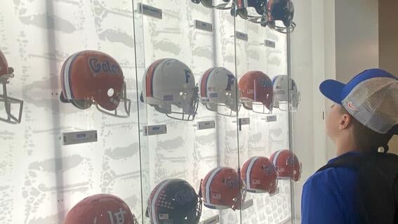 Levi looking at UF Helmets