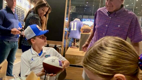 Levi Signed football