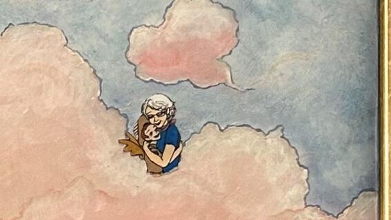 Mother hugging son in the clouds