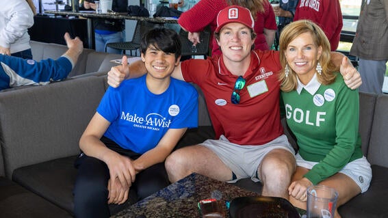 Grady and Amy with Mateo at the Wish It Forward Reunion