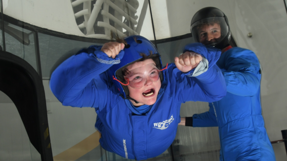 Ollie is suspended in the air above a cruise ship