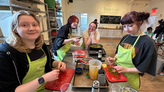 Roux and family at a cooking class.