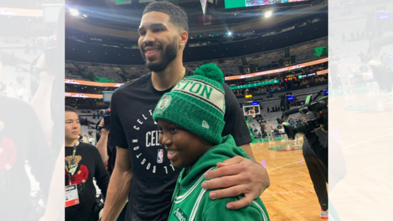 Ikenna poses for a photo with Jayson Tatum