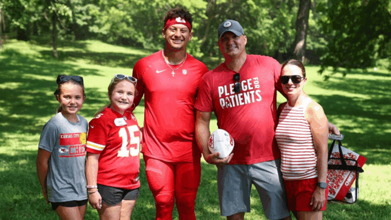 Libby with her family and Patrick Mahomes
