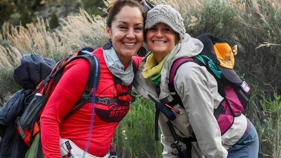 2 Hikers smiling