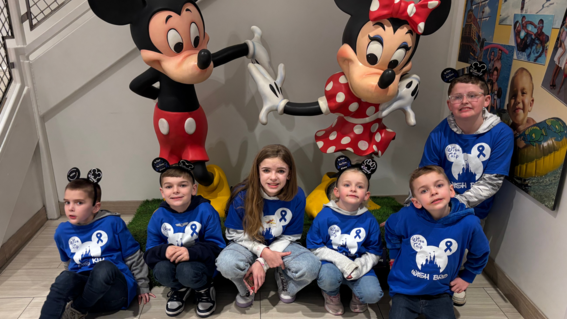Teagan with Mickey and Minnie