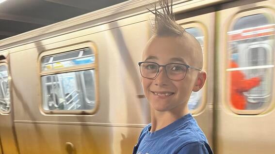 Brock in front of the subway