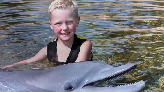 aiden with dolphin