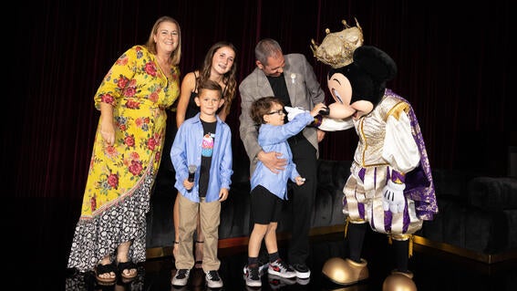 ocie gala 2024 wish kid and Mickey Mouse