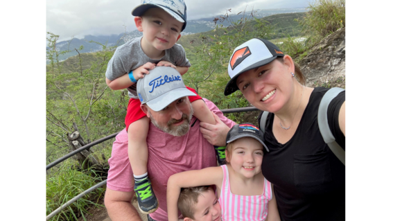 Wish kid Aileen and her family posing for a selfie in Hawaii
