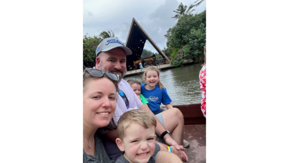 Wish kid Aileen poses for a selfie with her family in Hawaii