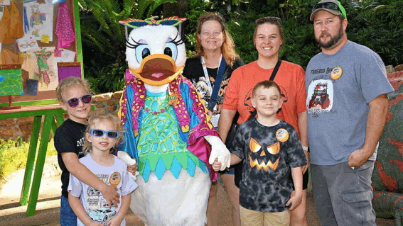Leon, family, with Donald and Daisy