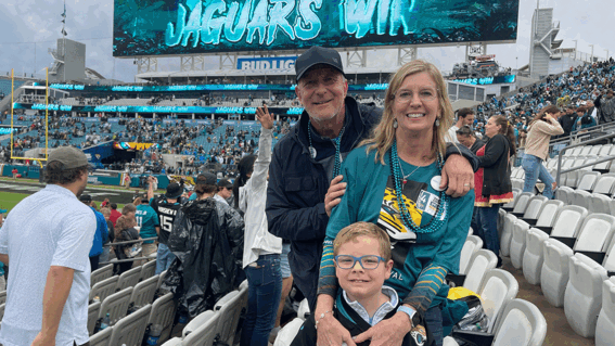 Blaze and family inside Jaguar's stadium
