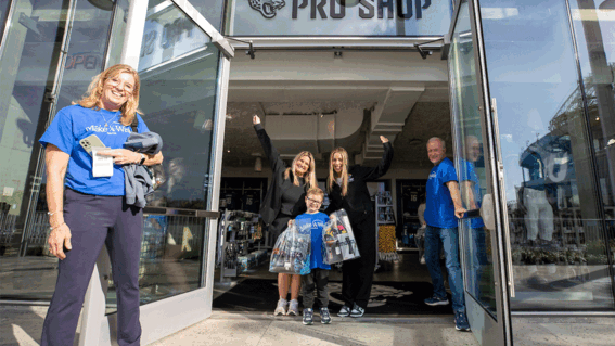 Blaze and family outside of Jaguar's pro shop.