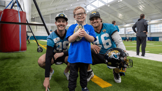 Blaze with two Jaguars' players