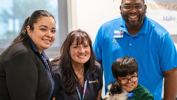 Dylan with WishMakers and Walmart employees
