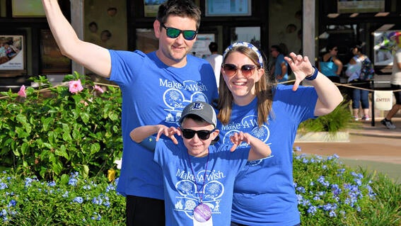 Noah and his family having fun at Disney World