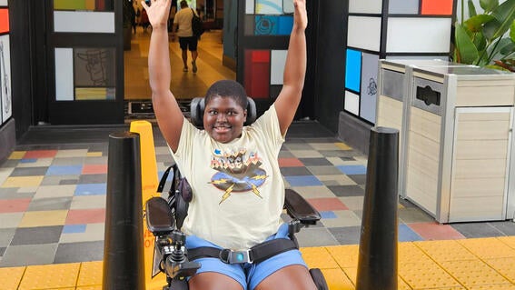 Bubacarr enjoys his wish to go to Disneyland.