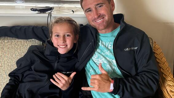 Caiya and her dad hanging ten