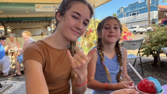 Caiya and her sister having a sweet treat