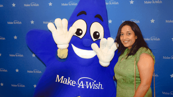 Sparkle standing next to Dr. Dharia
