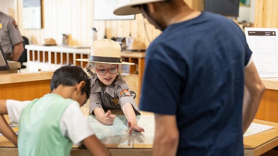 Ranger Sammy helps visitors