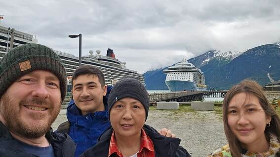 Rachael and her family in front of cruise ship